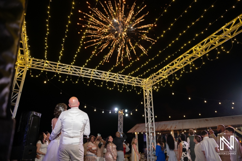 Wedding celebration at Playa Hunku with fireworks lighting the night sky