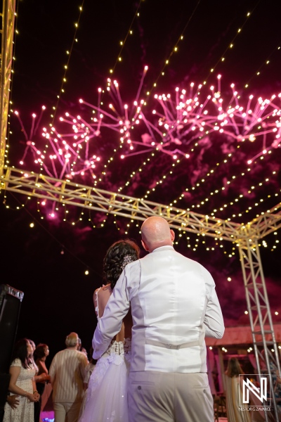 Couple celebrates wedding with fireworks at Playa Hunku in Curacao