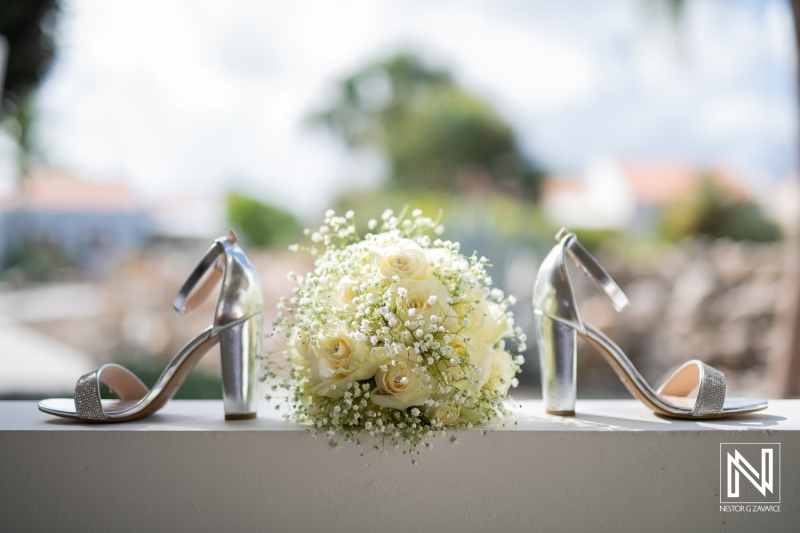 Bride bouquet and silver shoes