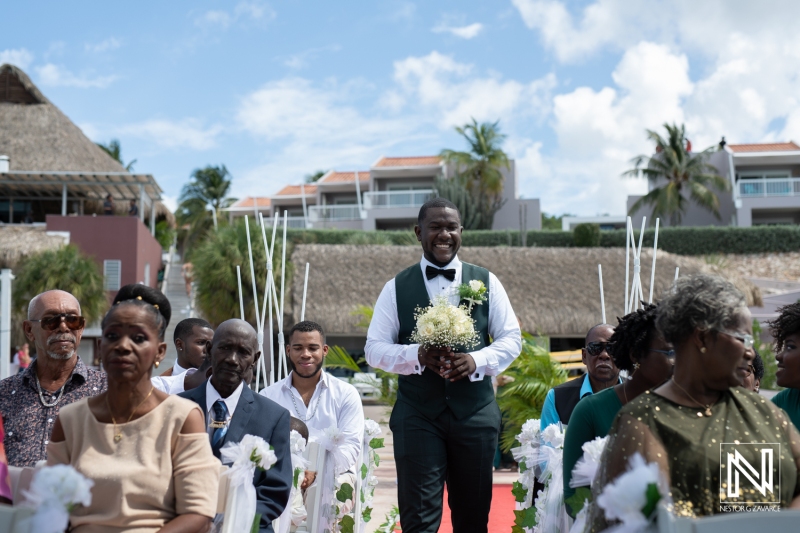 Groom walking the aisle