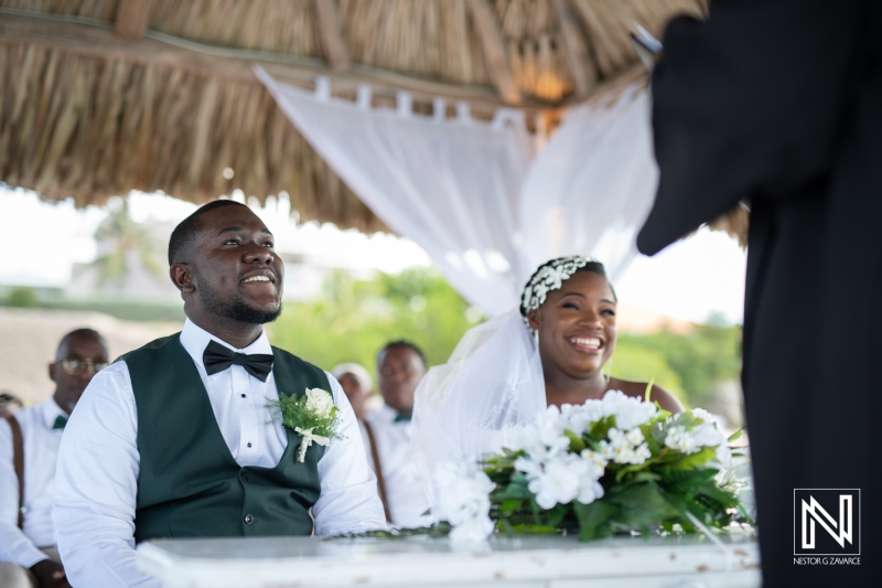 Bride and groom smiling in the civil ceremony