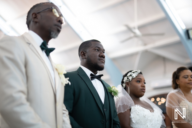 Bride and groom atteding in the church ceremony