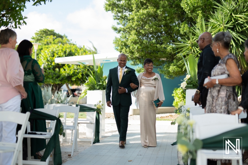 Groom walking down the aisle