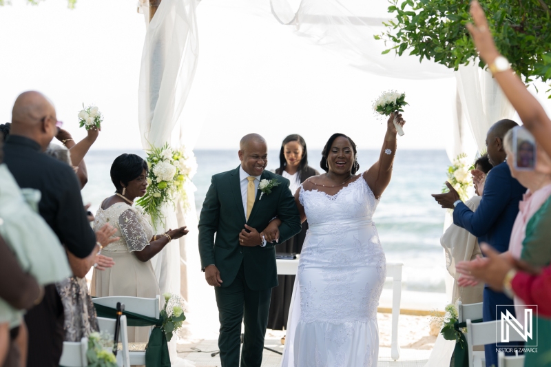 Bride and groom walking down the aisle