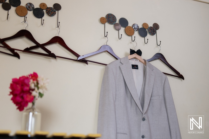 Wedding preparations at Landhuis Klein Santa Martha in Curacao with a groom's suit and elegant decor
