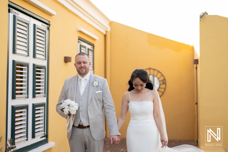 Couple enjoys a romantic moment after their wedding ceremony at Landhuis Klein Santa Martha in Curacao during sunset