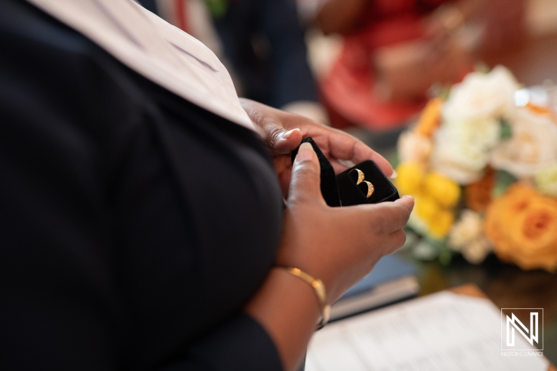Officiant with wedding rings