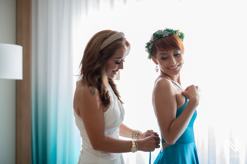 Bride getting into attire