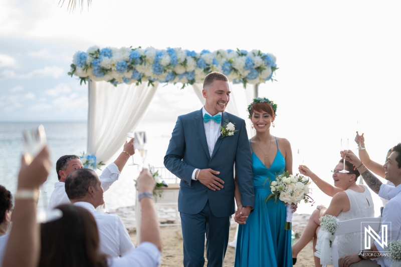 Bride and groom walking back the aisle