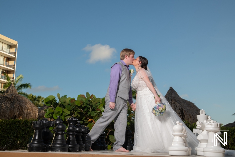 Bride and groom at chessboard