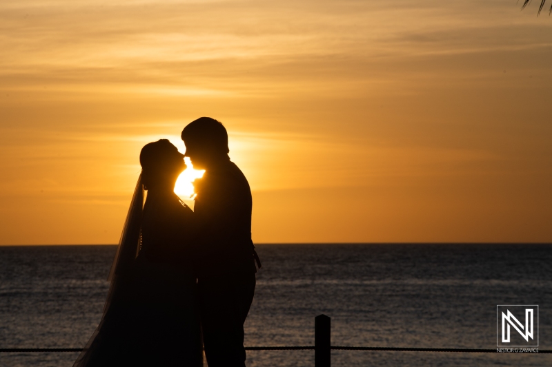 Silhouette shot with bride and groom