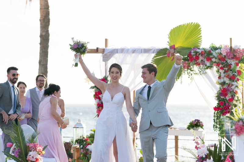 Bride and groom walking down the aisle