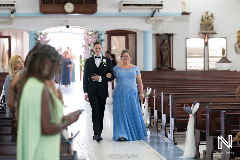 Groom walking down the aisle