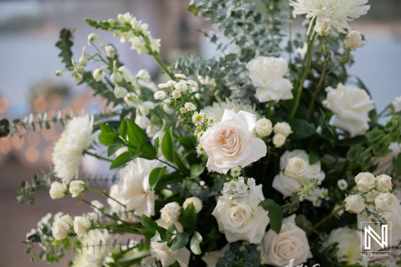 Flower arrangement at a wedding in Dreams Curacao Resort during a sunset ceremony