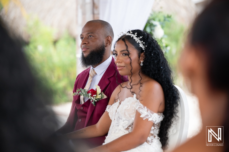 Wedding ceremony at Dreams Curacao Resort with couple during their special day in the tropical setting of the Caribbean