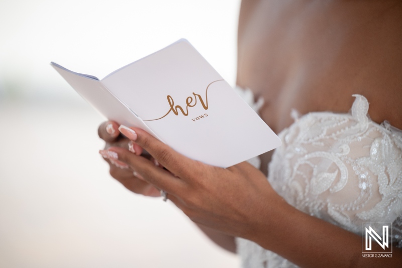 Couple exchanges vows at wedding ceremony in Dreams Curacao Resort on a sunny day