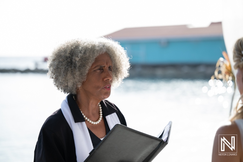 Wedding ceremony at Mood Beach in Curacao with an officiant and participants