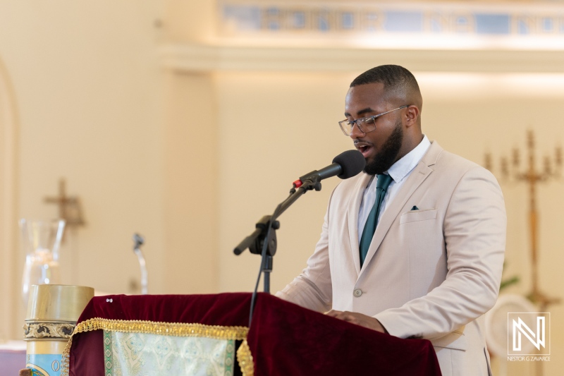 A Young Speaker Addressing an Audience at a Religious Ceremony in a Bright, Elegant Church During a Significant Event