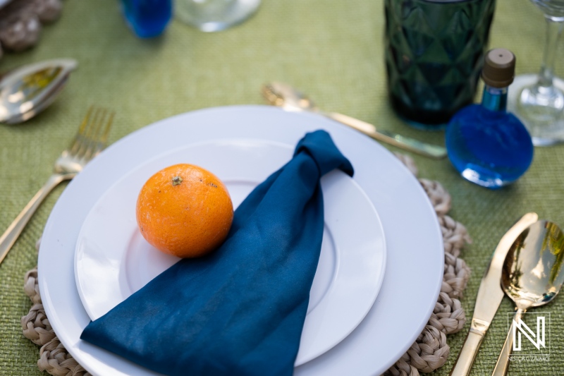 Wedding setup at Avila Beach Hotel in Curacao featuring table settings and decor details