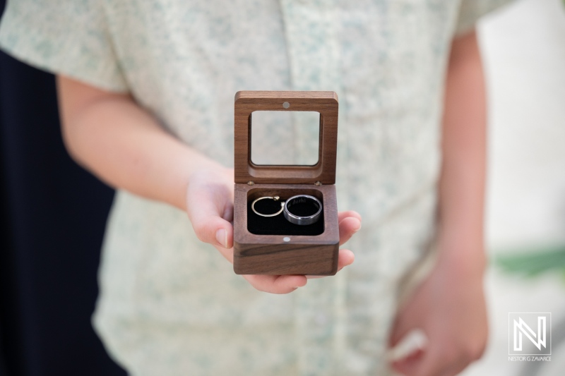 Wedding rings held in a wooden box at a wedding ceremony in Avila Beach Hotel, Curacao