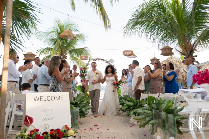 Wedding ceremony at Avila Beach Hotel in Curacao with guests celebrating
