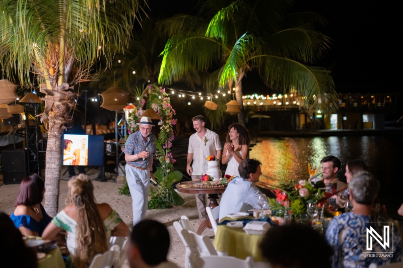 Celebration of love at Avila Beach Hotel in Curacao with family and friends enjoying the wedding festivities on the beach