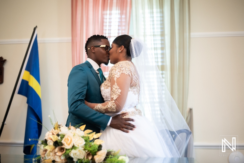 Bride and groom first kiss