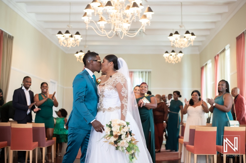 Bride and groom first kiss