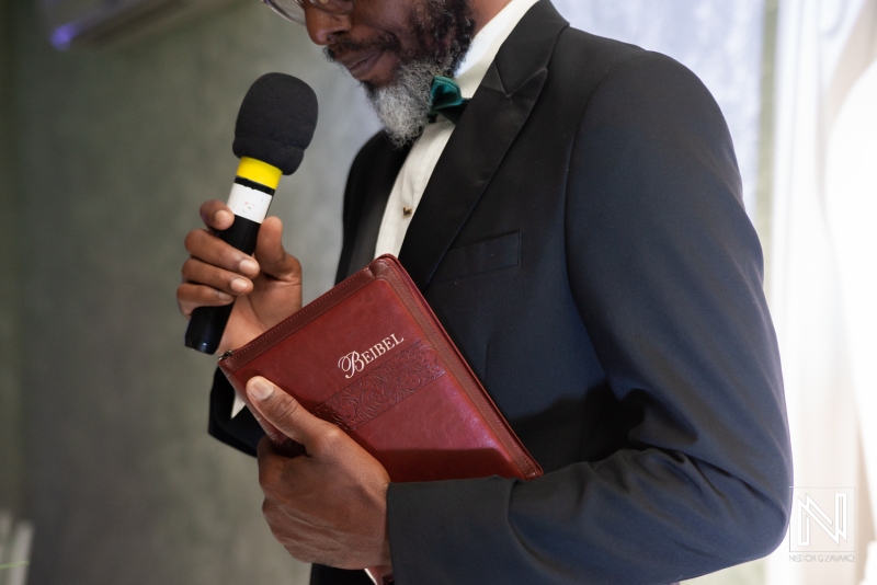 Priest with bible