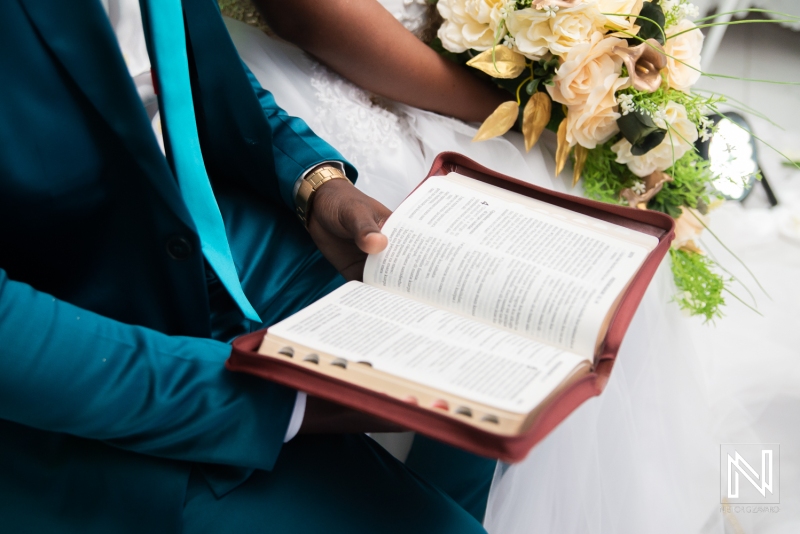 Groom holding the bible