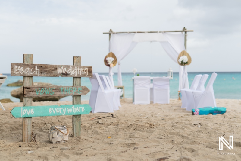 Beautiful wedding ceremony setup at Daaibooi Beach in Curacao featuring elegant decorations and scenic ocean views
