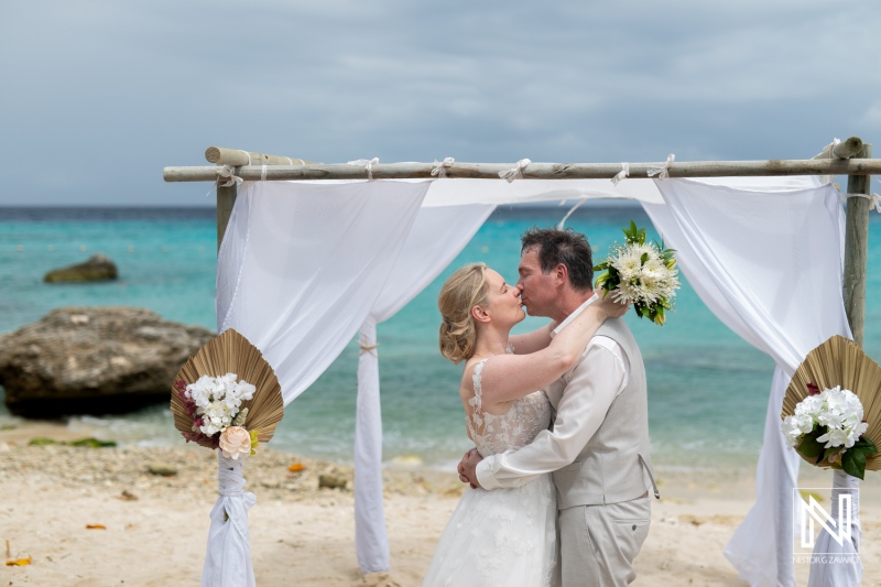 Celebrating love at Daaibooi Beach in Curacao with a romantic wedding ceremony