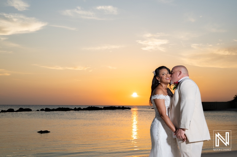 Romantic wedding celebration at Sunscape Curacao Resort during sunset with a stunning beach backdrop