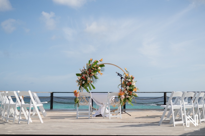 Gorgeous wedding setup at Curacao Marriott Beach Resort during sunset with stunning ocean views