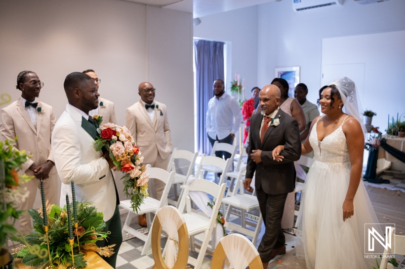 Wedding ceremony at Avila Beach Hotel in Curacao with guests and couple ready for celebration