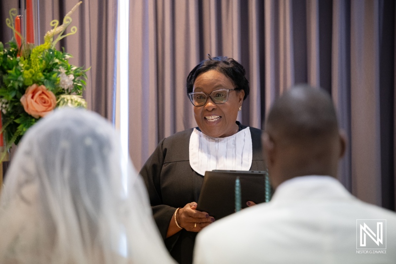 Wedding ceremony at Avila Beach Hotel with guests and officiant present