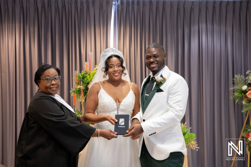 Couple exchanges vows at Avila Beach Hotel in Curacao during their wedding ceremony