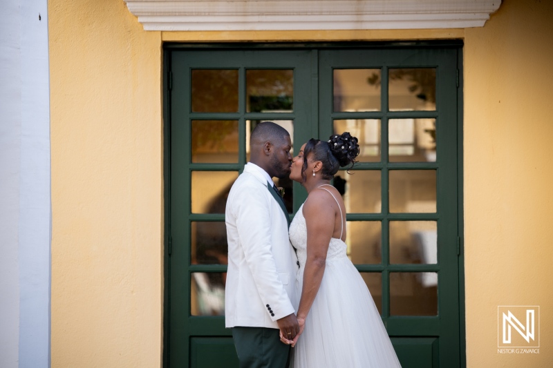 Couple shares a moment at wedding venue in Avila Beach Hotel, Curacao