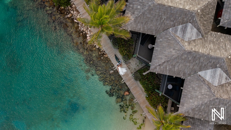Couple celebrates wedding at Avila Beach Hotel in Curacao with beautiful beachfront view