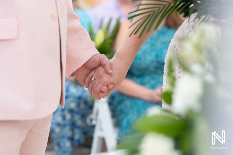 Bride and groom holding hands