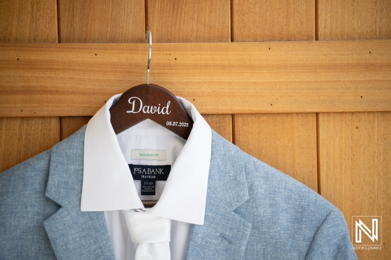 Wedding attire hanging at Dreams Curaçao Resort on the day of celebration