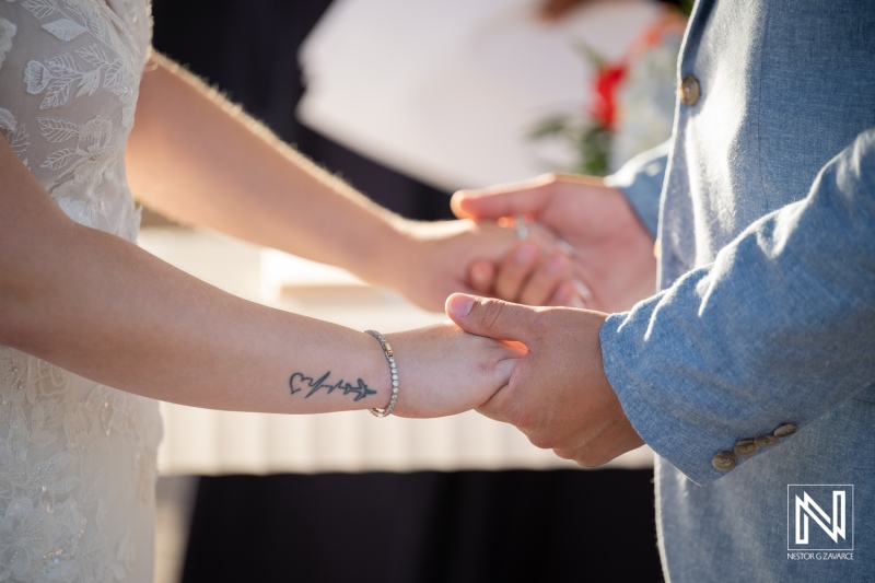 Couple exchanging vows at wedding ceremony at Dreams Curacao Resort, Spa Casino