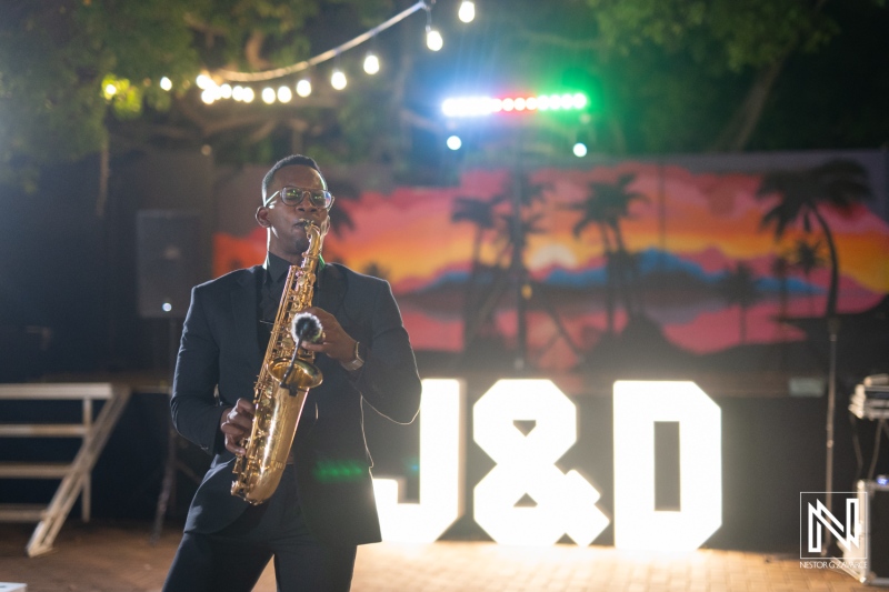 Musician playing saxophone during wedding celebration at Dreams Curacao Resort Spa Casino in Curacao
