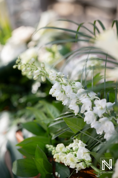 Wedding ceremony at Renaissance Wind Creek in Curacao with floral decorations