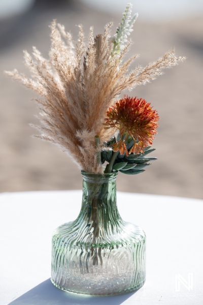Wedding flowers in a vase at Renaissance Wind Creek in Curacao during a wedding event