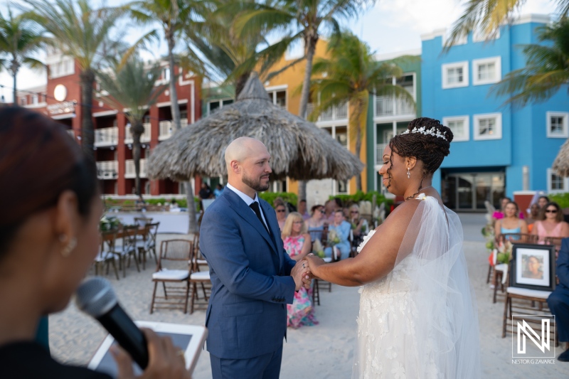 Couple exchanges vows during wedding ceremony at Renaissance Wind Creek in Curacao