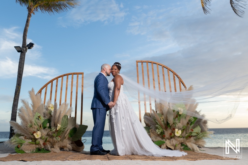 Couple shares moment during wedding ceremony at Renaissance Wind Creek in Curacao