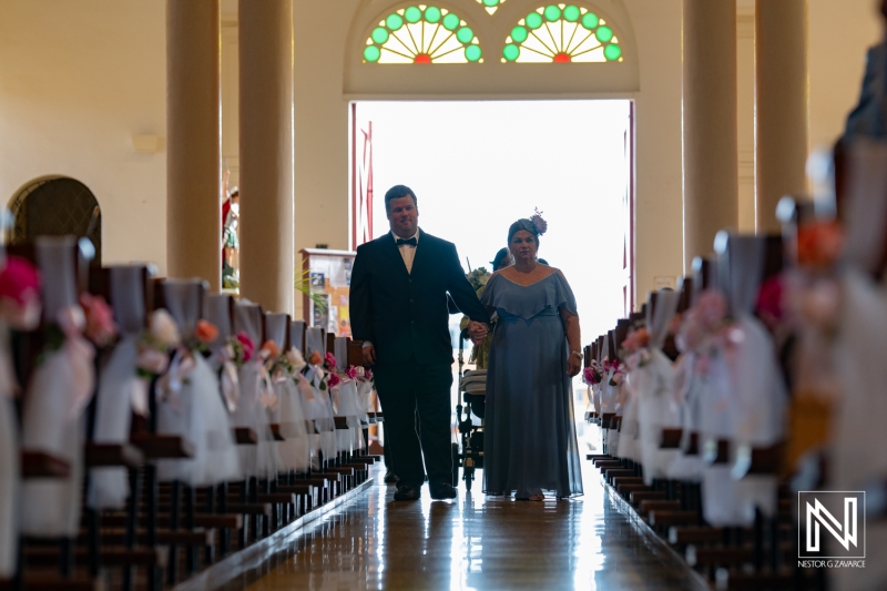Groom walking down the aisle
