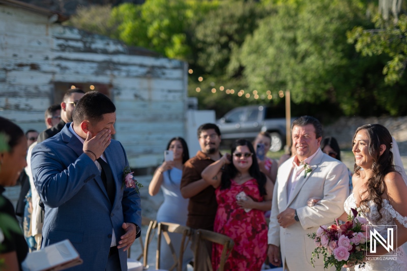 Celebration of love at Playa Hunku in Curacao with emotional moments during a wedding ceremony