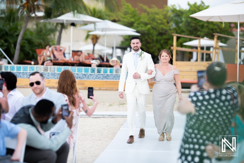 Groom walking down the aisle